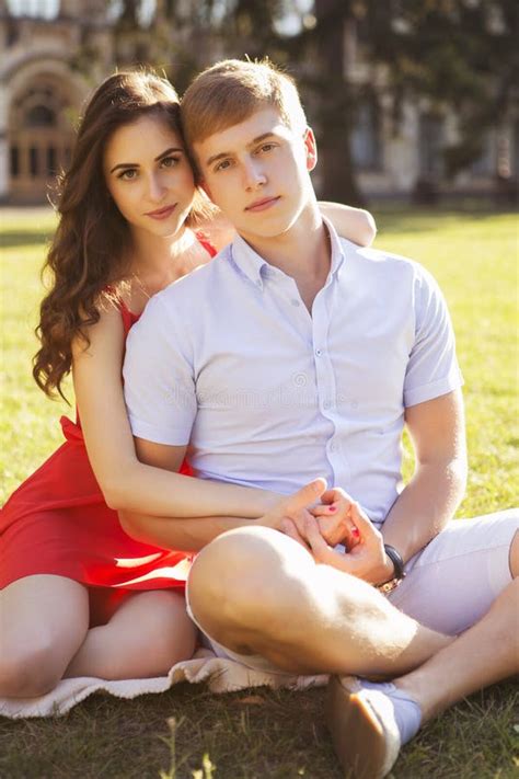 Beautiful Brunette Couple In Love Hugging On A Date In The Park Stock Image Image Of Summer