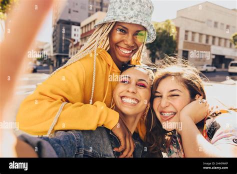 Trio Of Friends Taking A Selfie Together Group Of Multiethnic Female Friends Having Fun
