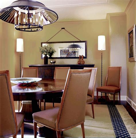 A mirror in the dining room enhances the social sense of family and camaraderie while a mirror in the family room or living room furthers the warmth of the home. Pretty mirrored buffet in Dining Room Contemporary with ...
