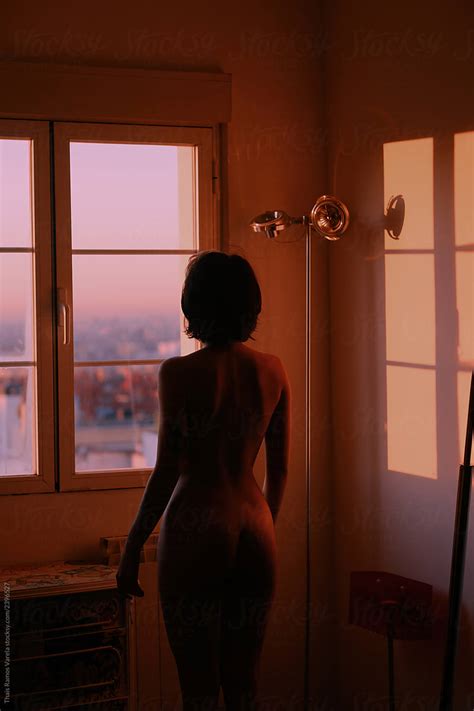 Anonymous Woman Contemplating The Naked Sunrise By Stocksy Contributor Thais Ramos Varela