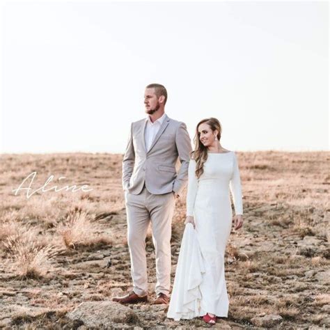 We deliver to any country. Style 8936: Crepe Long Sleeve Wedding Dress with Beaded ...
