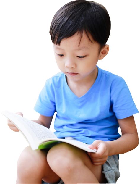 Little Chinese boy reading | Free Stock Photos - 1designshop