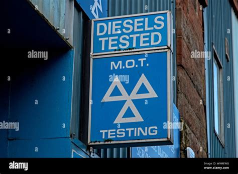 Mot Testing And Diesels Tested Signs Outside A Garage In Leith