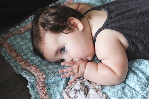 Baby rolling in their sleep or tummy sleeping? | Strong Beginnings