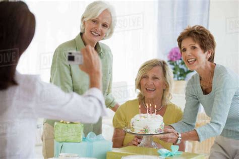 Senior Women Celebrating Friends Birthday Stock Photo Dissolve
