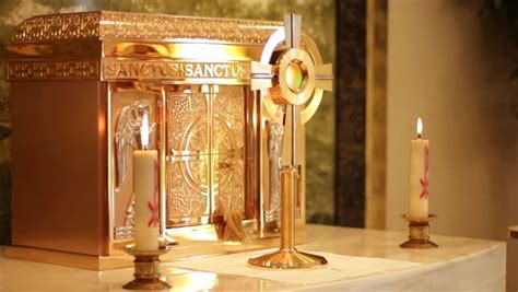 Tabernacle And Monstrance In Adoration Chapel Pan Left To Red Flowers