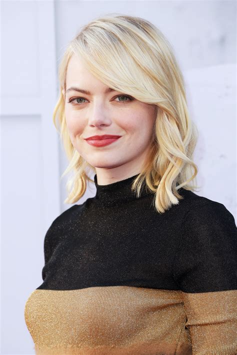 Platinum blonde hair in warm and cool tones. Emma Stone Unveils Platinum Blonde Hair Color - Teen Vogue