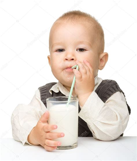 Cute Little Boy Is Drinking Milk Stock Photo By ©kobyakov 6457854