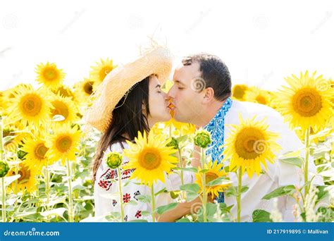 Couple Kissing In A Field Of Sunflowers Stock Image Image Of Girl Field 217919895