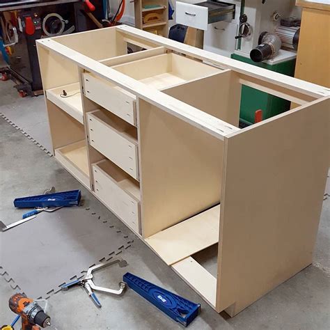 The Cabinets Are Being Built And Ready To Be Installed In The Shop Or