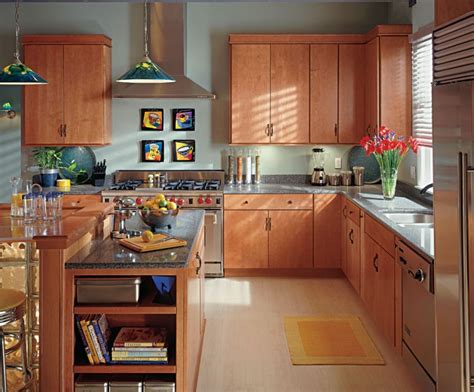 With cherry cabinets, you are automatically working with a strong element of warmth, from within the natural tones of. Cherry Kitchen Cabinets With Gray Wall And Quartz ...