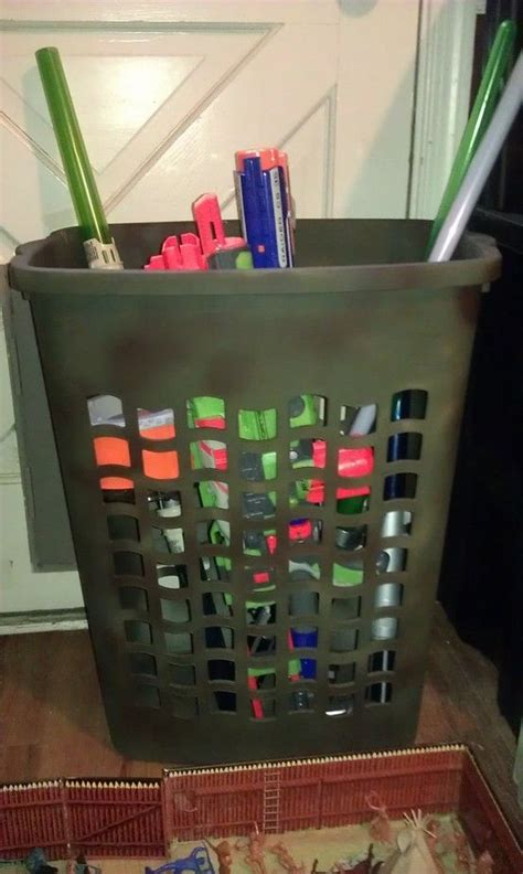 This little devil can shoot your darts a staggering diy nerf gun storage rack the handyman s daughter from www.thehandymansdaughter.com. 25 Storage Tips & Tricks A tall clothes hamper for big ...