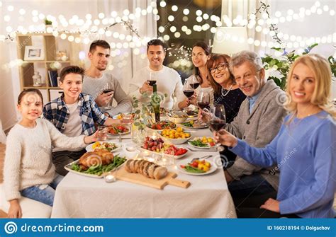 We had a lot of fun and the decoration was beautiful. Happy Family Having Dinner Party At Home Stock Photo ...