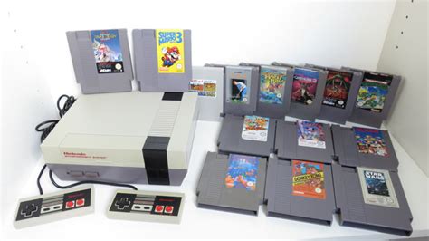 Nintendo Nes Collection Including 2 Controllers And Some