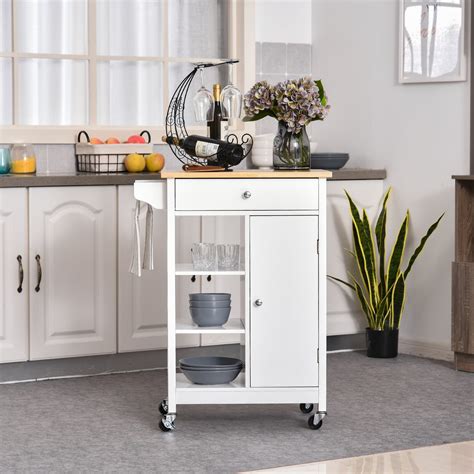 Carrito mobil para hacer carnes asadas y al carbon, tiene plancha y rejilla, tiene puesto de salsas, compartimientos y puesto de pipeta de gas, es en acero inoxidable. HOMCOM Carrito de Cocina Carro de Servicio Multifuncional ...