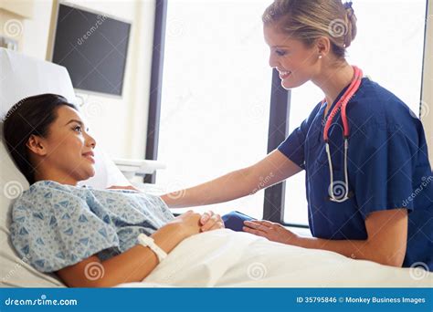 Nurse Talking To Female Patient On Ward Stock Photo Image Of Patient
