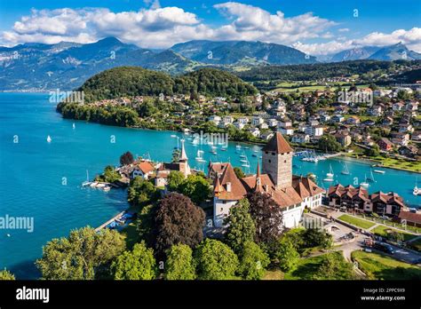 Aerial Panoramic View Of Spiez Church And Castle On The Shore Of Lake