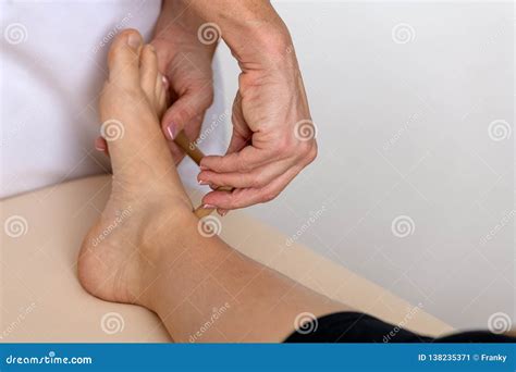 professional massage therapist working on a woman hand and foot stock image image of