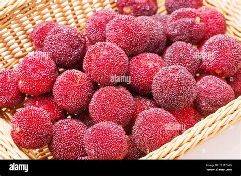 Red And Ripe Waxberry Under White Background Stock Photo Alamy