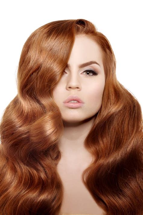 model with long red hair waves curls hairstyle hair salon updo fashion model with shiny hair