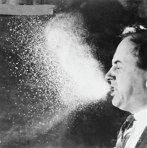 Man Sneezing By Bettmann