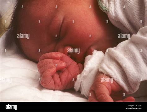 New Born Baby Sleeping On Side Stock Photo Alamy