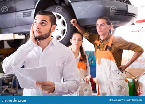 Worried Client In A Repair Shop Stock Image Image Of Male Mechanic