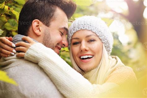 Young Happy Couple In The Park In Autumn 15896473 Stock Photo At Vecteezy