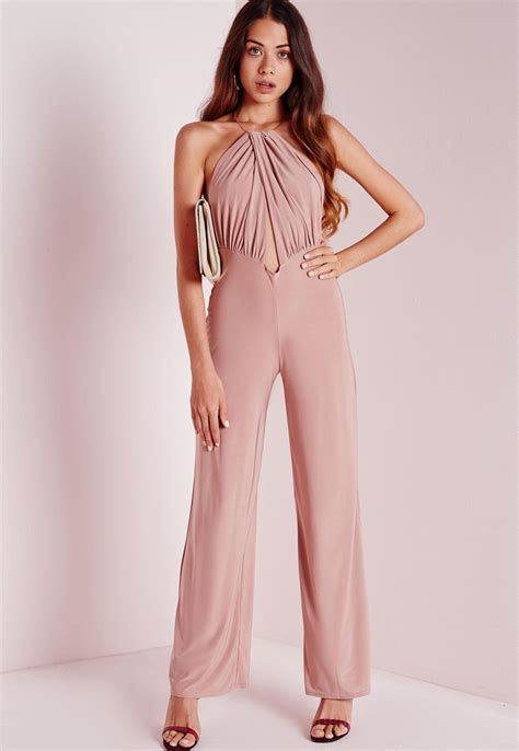 The Childlike Look In A Pink Jumpsuit