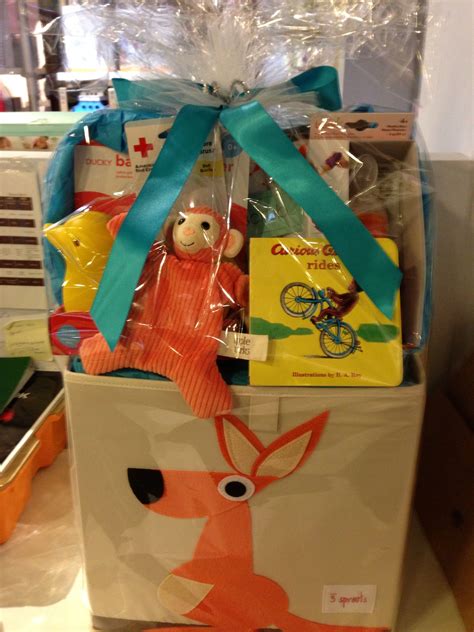How to create gift baskets. $100 @Tadpole Gift Basket #curiousgeorge #boardbook # ...