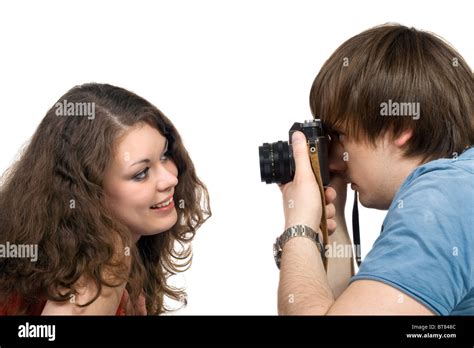 Photographer Taking Pictures Of The Young Woman Isolated 3 Stock Photo