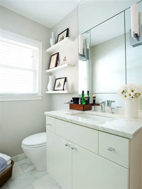Graduated open shelving in rich wood can add not only color and depth to over the toilet shelving but it also allows for more decorative aspects in between wall spaces. Shelving Above Toilet | Houzz