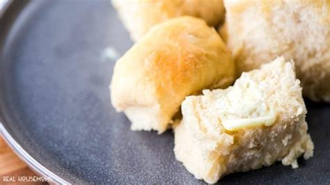 mamaw s rolls on a plate torn open and spread with butter dinner rolls recipe dinner rolls