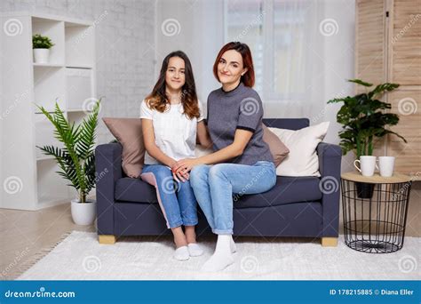 Mother And Daughter Sitting In Living Room Stock Image Image Of Indoor Mother 178215885
