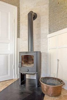 Antique godin scandinavian style wood burning stove. Classic and modern Scandinavian wood stoves. on Pinterest ...