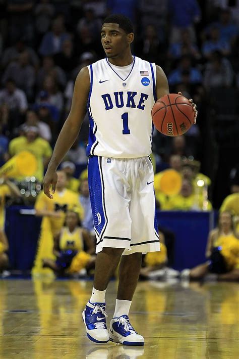 Kyrie Irving Of The Duke Blue Devils Moves The Ball While Taking On