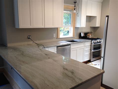 Some have different striations of gray that give them a slightly. Sea Pearl Quartzite- perimeter countertops with white ...