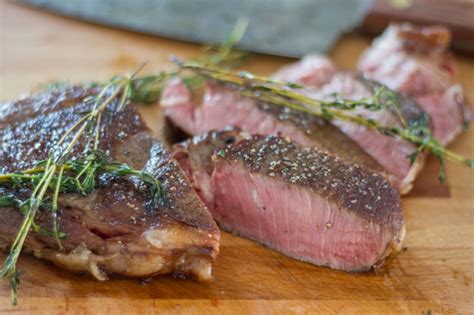 Tilt skillet toward you and scoot steak to the far end of pan so that garlic and rosemary slide down into the foaming butter. Sous Vide Butter-Basted Ribeye