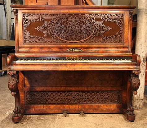 Hopkinson Upright Piano For Sale With A Burr Walnut Case And Fretwork