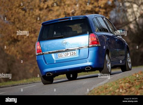 Opel Zafira Opc Model Year Blue Moving Diagonal From The Back