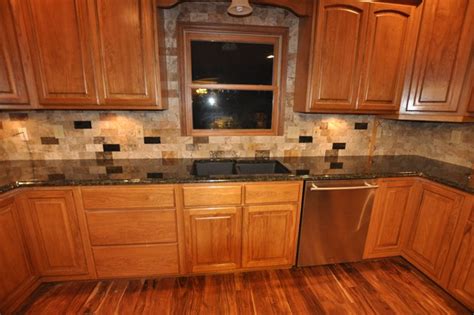 Backsplashes can also help control the heat and moisture in a kitchen so it does not get into other areas of the home. Granite Countertops and Tile Backsplash Ideas - Eclectic ...