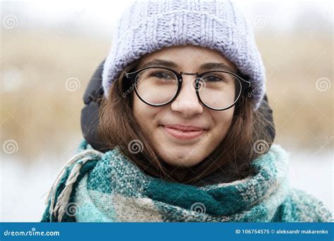 beautiful girl in round glasses and a knitted hat stock image image of caucasian cute 106754575