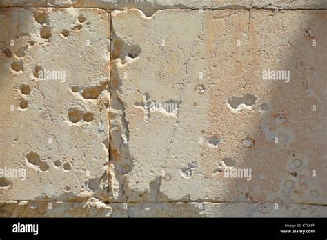 Bullet Holes In The Marble Walls Of An Ancient Temple Stock Photo Alamy