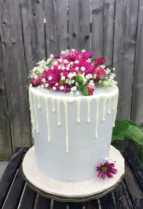Check spelling or type a new query. Drop cake with fresh flowers.