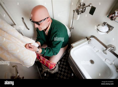 Man Sitting On Toilet In Public Hi Res Stock Photography And Images Alamy
