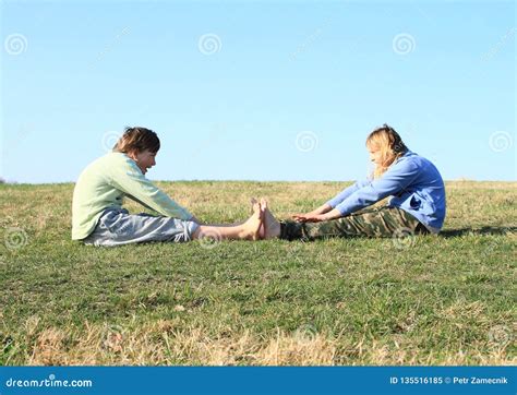 Smiling Kids Exercising On Meadow Stock Image Image Of Clear