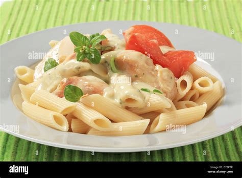 Pasta Tubes Chicken Meat And Cream Sauce Stock Photo Alamy