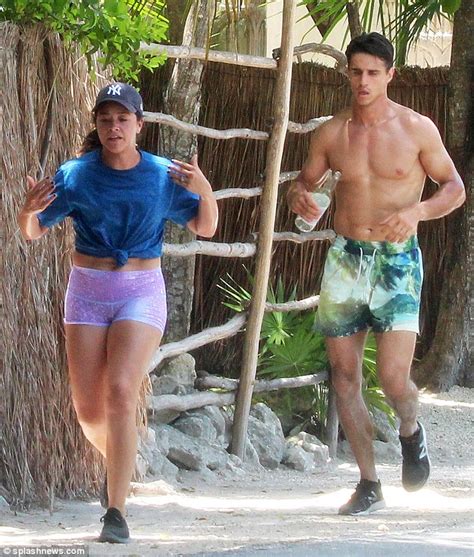 gina rodriguez flashes her diamond ring as she works out with joe locicero after becoming