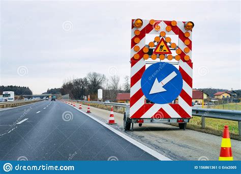 Arrow Down Left Reflective Direction Road Sign Stock Image