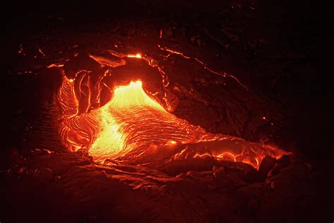 Hot Magma Emerges From A Crack In The Earth Photograph By Ralf Lehmann